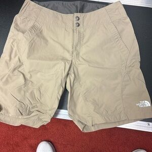 The north face tan performance shorts  size small